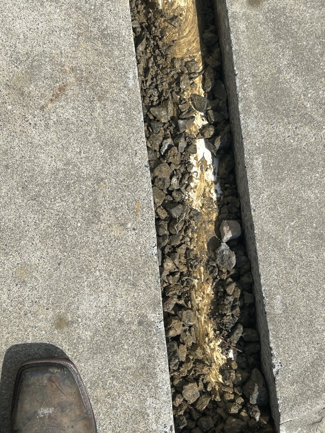 Drain base and surrounding area prepared