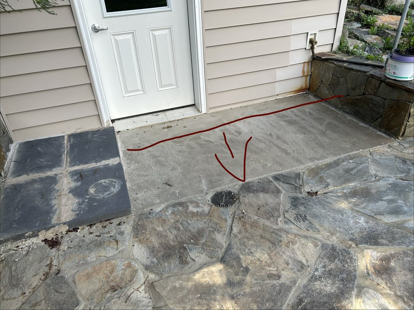 Doorway drainage area before repairs